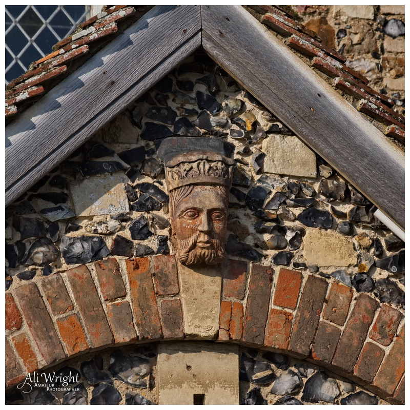 Detail of King's Head on Porch